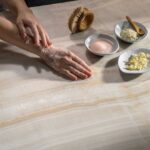 Caesarstone 509 Onyxa Porcelain surface with hand